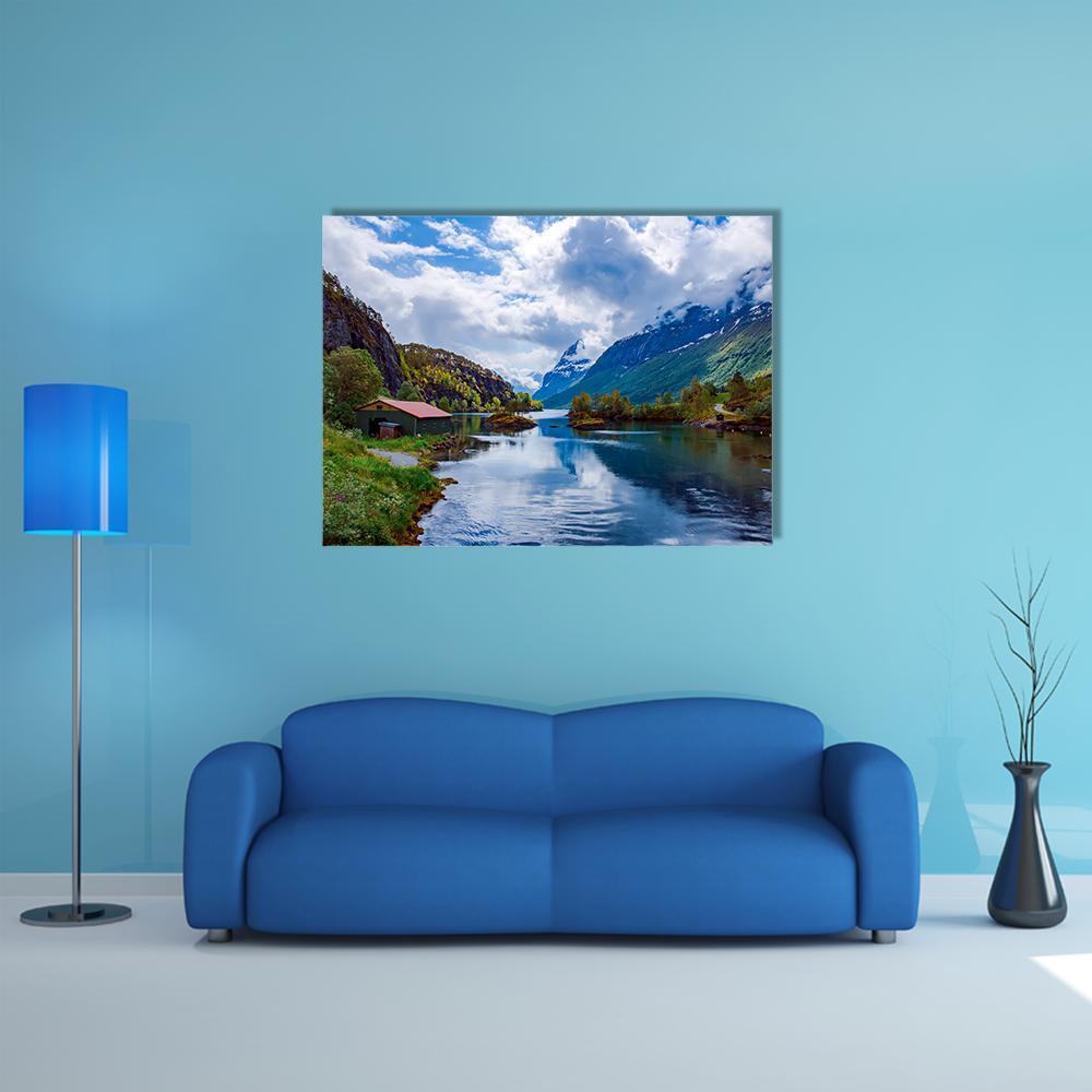 Lovatnet Lake, Norway Canvas Wall Art in white, green and blue, single panel hung on a wall