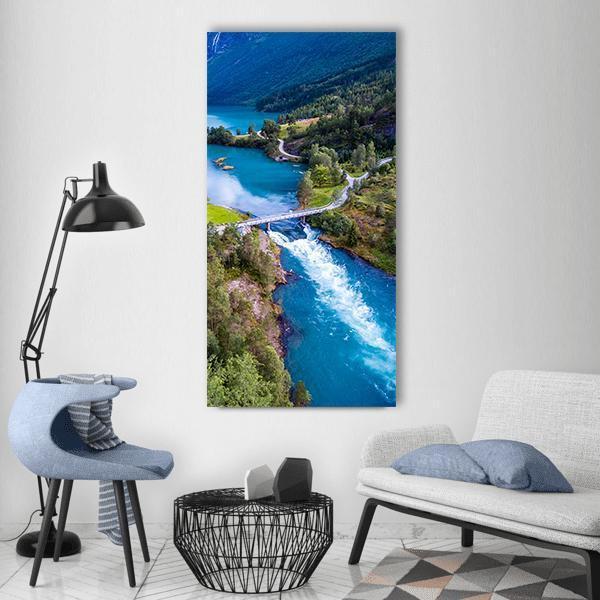 Lovatnet Lake Norway Vertical Canvas Wall Art in green and blue, single vertical panel hung on a wall