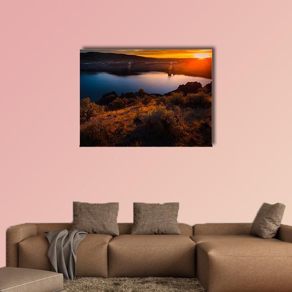 Lucky Peak Lake at Sunset Canvas Wall Art in brown, orange and blue, single panel hung on a wall