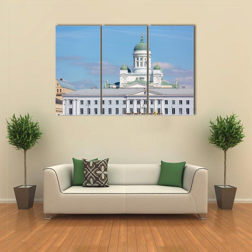 Lutheran Cathedral with Green Dome Canvas Wall Art in white, green and blue, 3 panel horizontal set hung on a wall