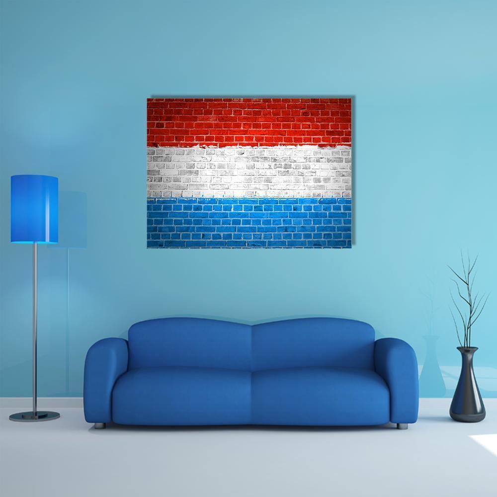 Luxembourg Flag on Painted Brick Canvas Wall Art in white, red and blue, single panel hung on a wall