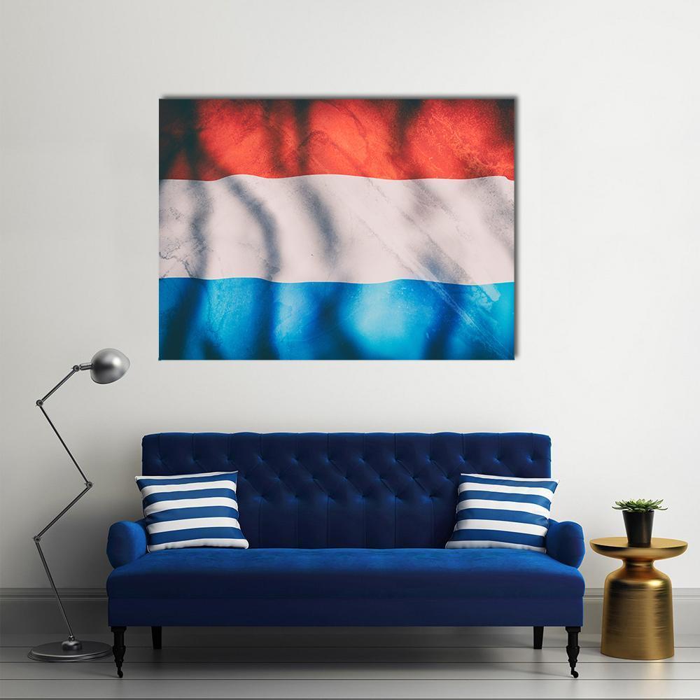 Waving Luxembourg Flag Canvas Wall Art in white, red and blue, single panel hung on a wall