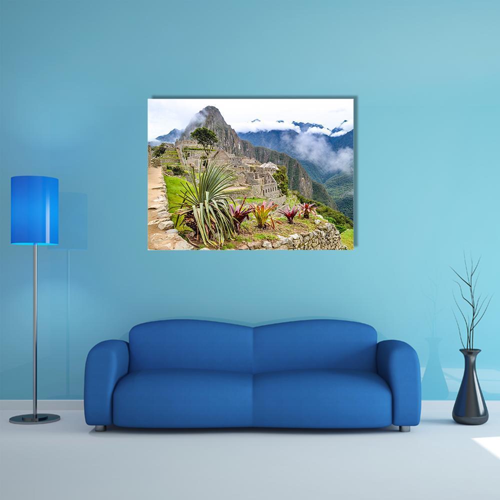 Machu Picchu Misty Andean Ruins Canvas Wall Art in gray, green and blue, single panel hung on a wall