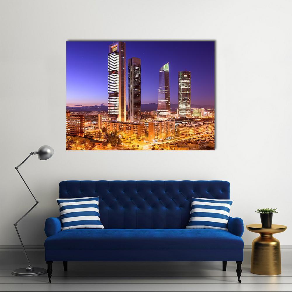 Madrid Financial District Skyline Canvas Wall Art in orange, blue and purple, single panel hung on a wall