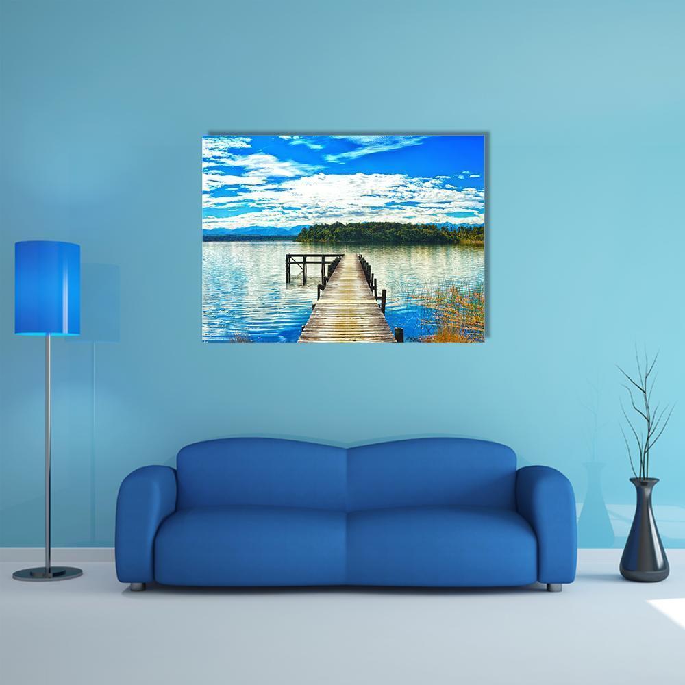 Lake Mahinapua Wooden Pier Canvas Wall Art in white, green and blue, single panel hung on a wall