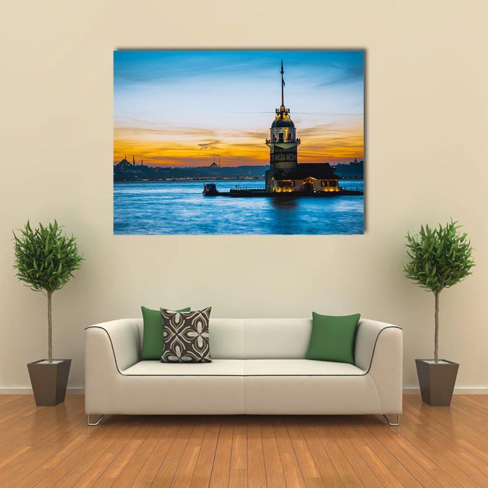 Maiden's Tower at Sunset Canvas Wall Art in orange, yellow and blue, single panel hung on a wall