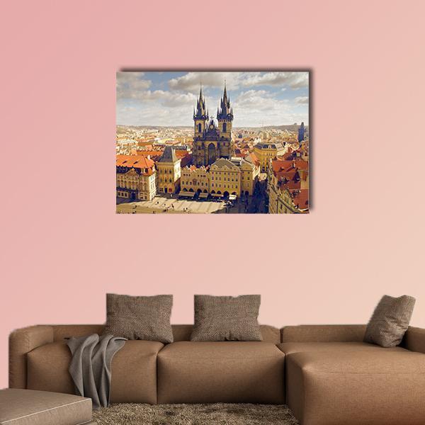 Prague Old Town Square Canvas Wall Art in beige, brown and orange, single panel hung on a wall
