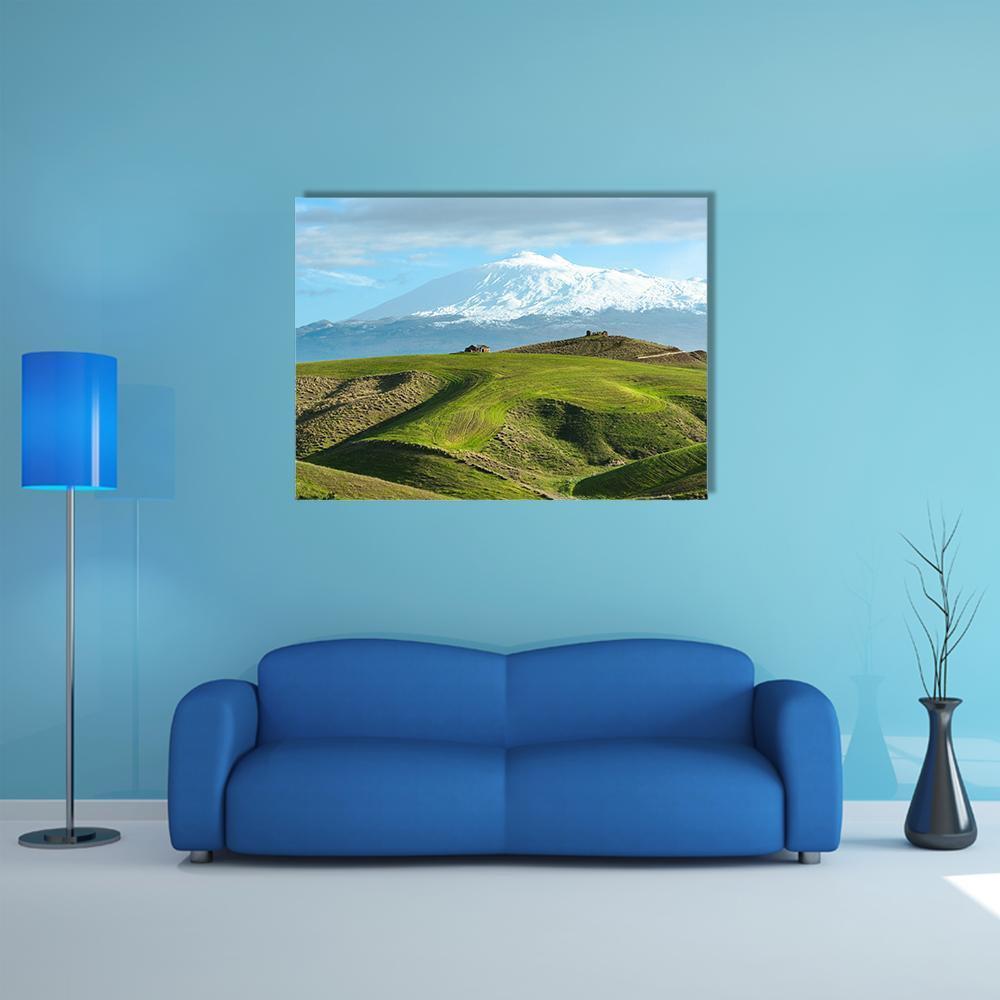 Mount Etna Over Farmhouse and Fields Canvas Wall Art in white, green and blue, single panel hung on a wall