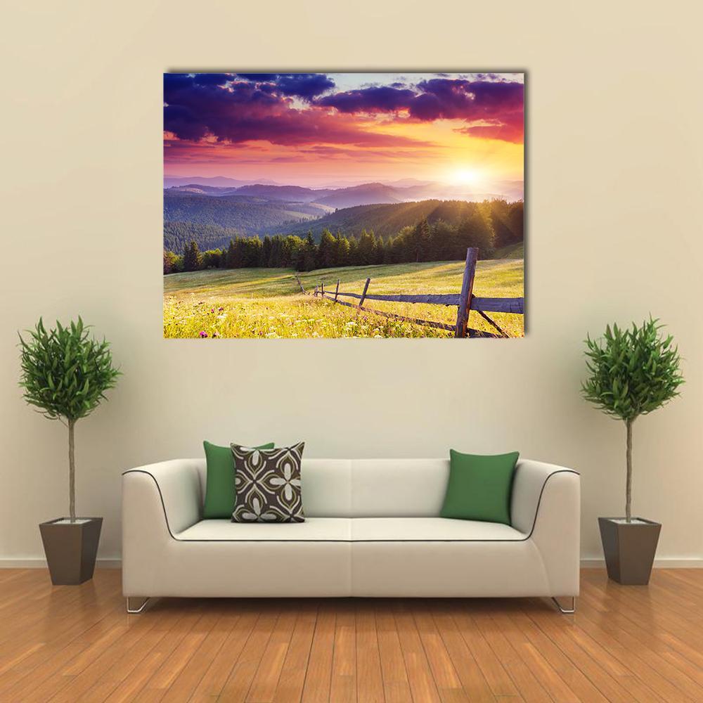 Mount Carpathian Sunset Canvas Wall Art in yellow, green and purple, single panel hung on a wall