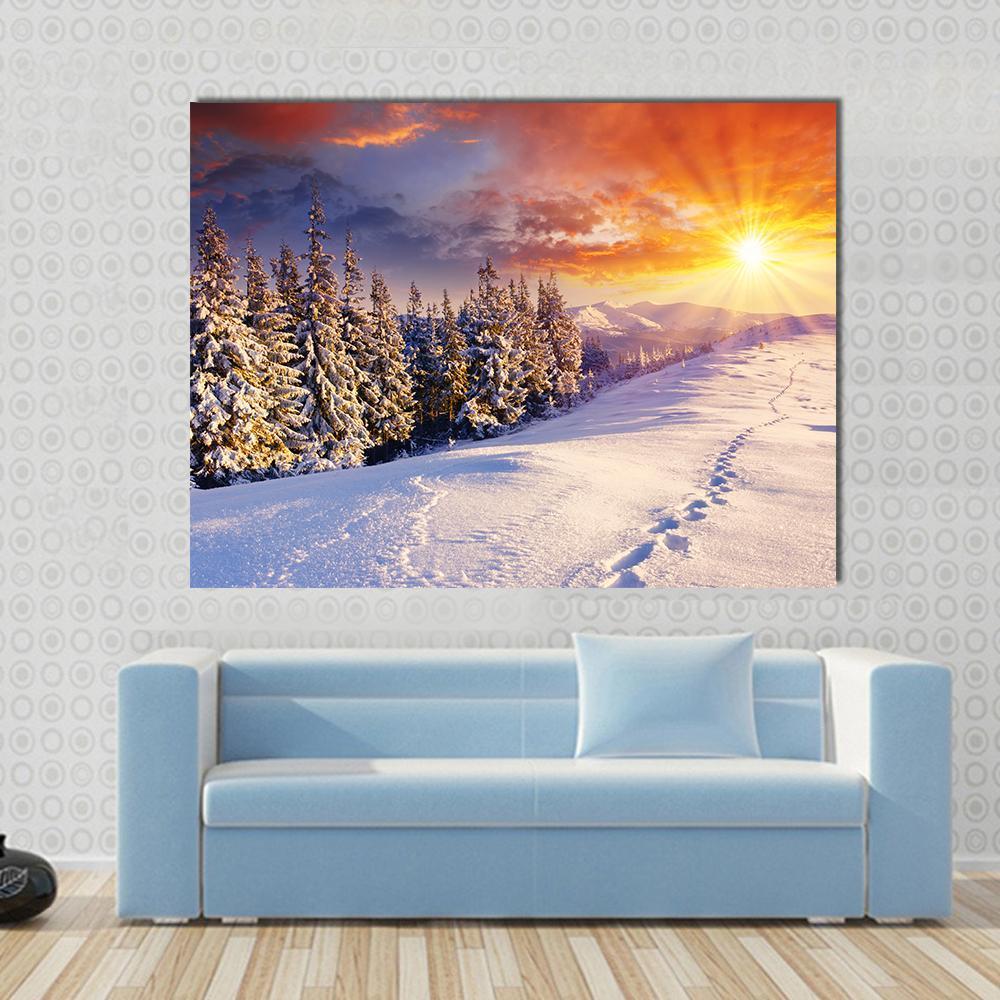 Majestic Sunset in Winter Mountain Canvas Wall Art in white, orange and blue, single panel hung on a wall