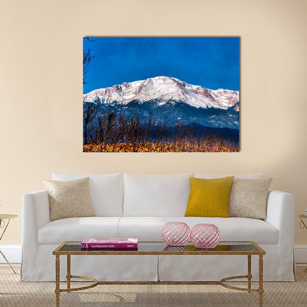 Pikes Peak Snow-capped Mountain Canvas Wall Art in white and blue, single panel hung on a wall