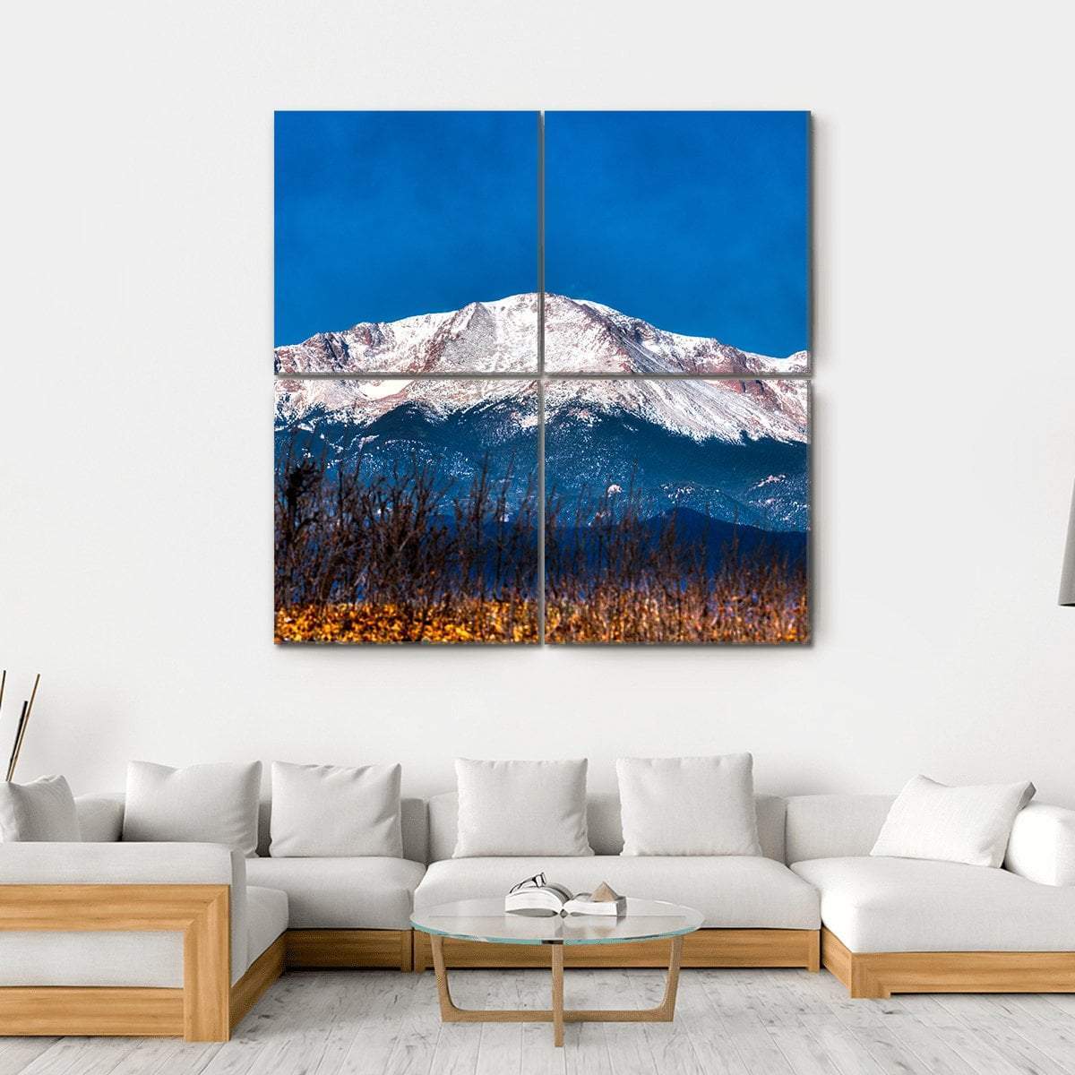 Pikes Peak Snow-capped Mountain Canvas Wall Art in white, brown and blue, hung on a wall