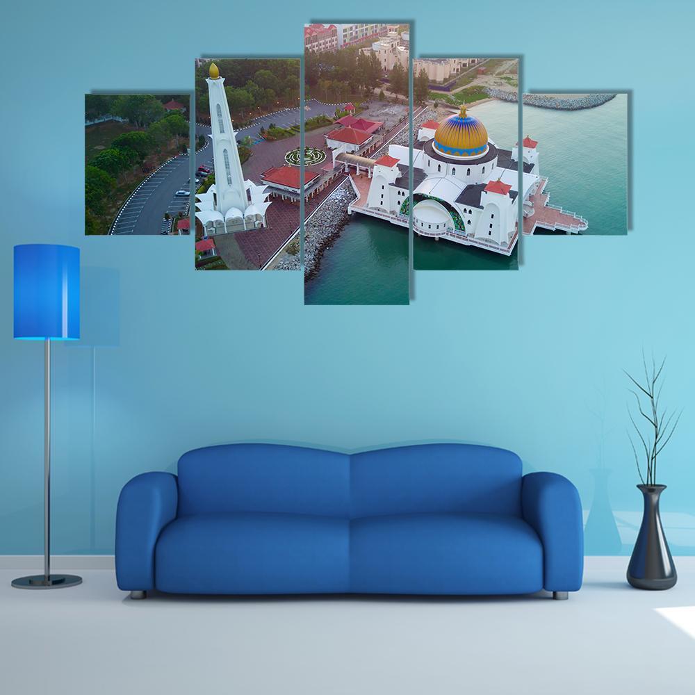 Malacca Straits Mosque Canvas Wall Art in white, green and blue, 5 panel Star layout hung on a wall
