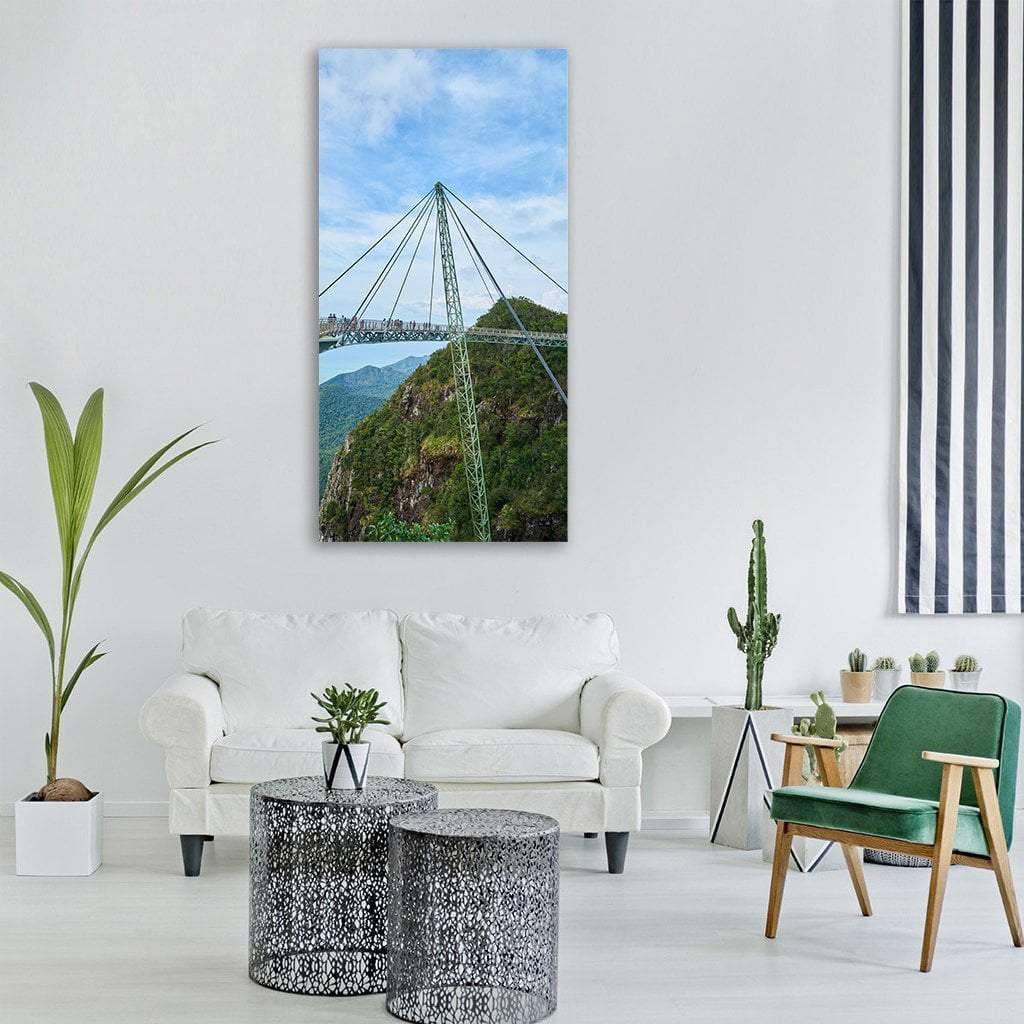 Langkawi Sky Bridge Over Jungle Chasm Vertical Canvas Wall Art in green and blue, single vertical panel hung on a wall