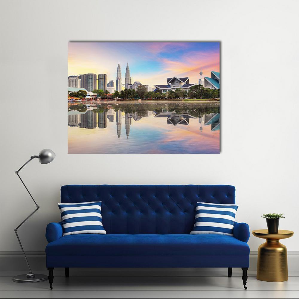 Malaysia Skyline with Petronas Twin Towers Canvas Wall Art in yellow, blue and pink, single panel hung on a wall