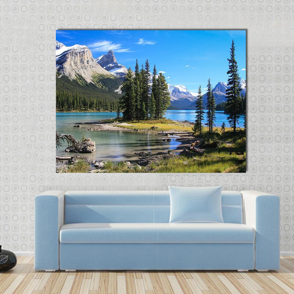 Maligne Lake Landscape Canvas Wall Art in gray, green and blue, single panel hung on a wall