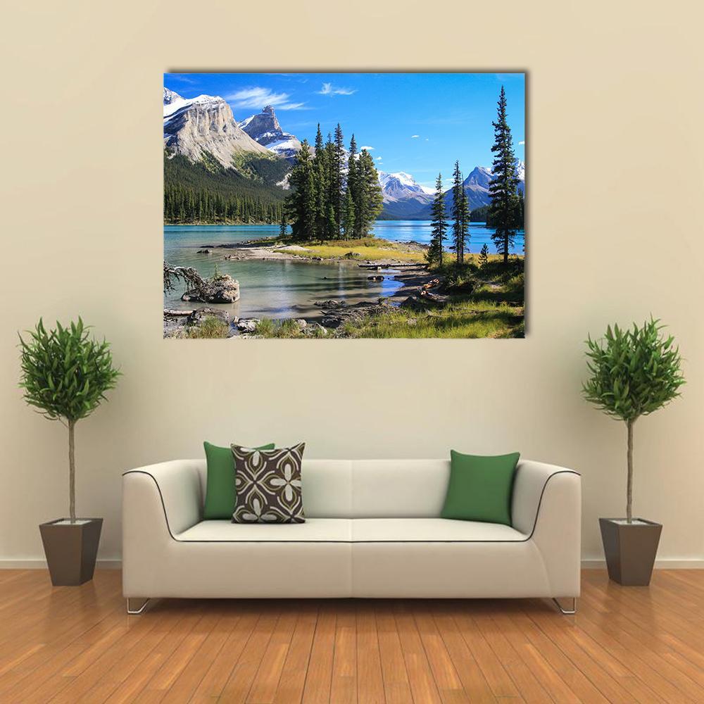 Maligne Lake with Island Reflection Canvas Wall Art in gray, green and blue, single panel hung on a wall