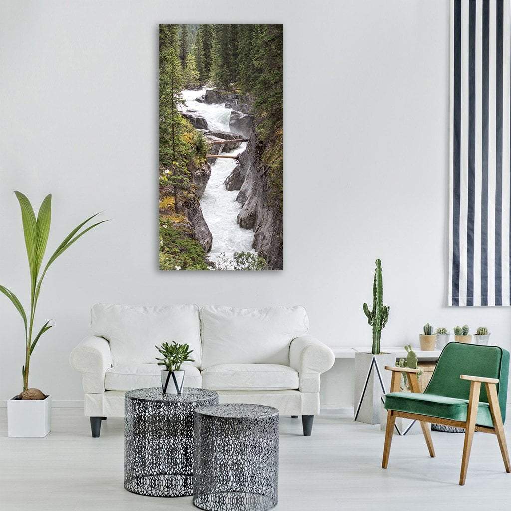 Maligne River Rapids Vertical Canvas Wall Art in white, gray and green, single vertical panel hung on a wall