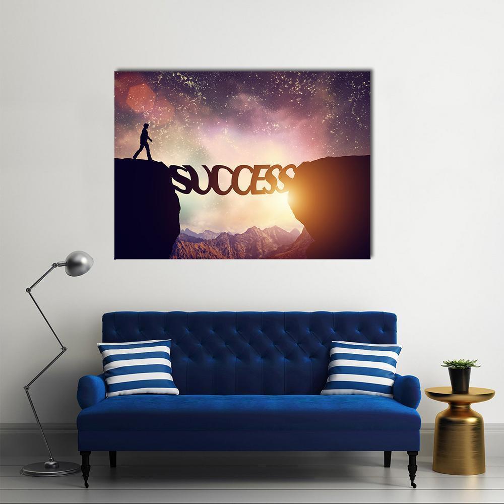 Success Bridge with Walking Silhouette Canvas Wall Art in black, orange and purple, single panel hung on a wall