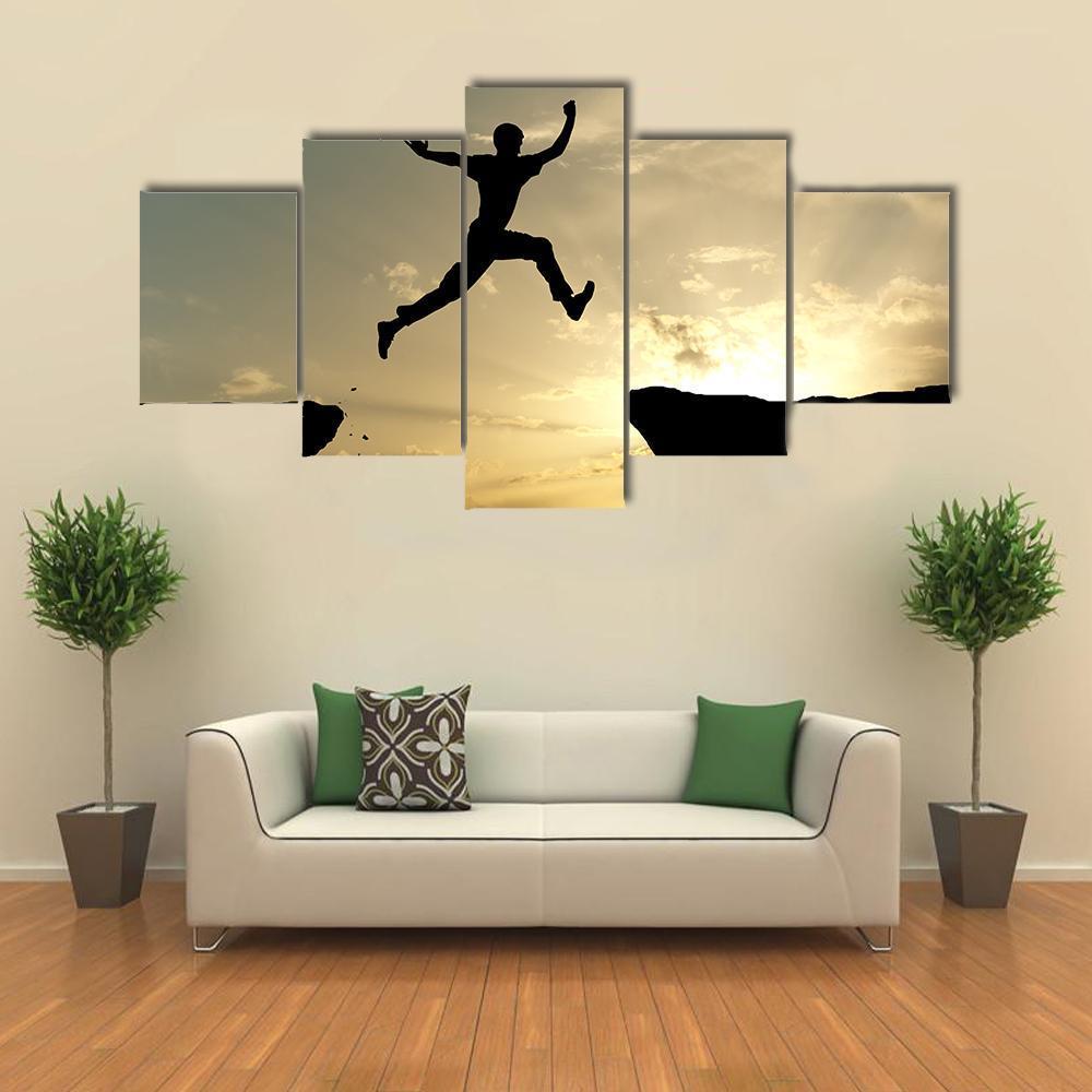 Man Jump Through Gap Canvas Wall Art-5 Star-Gallery Wrap-62" x 32"-Tiaracle
