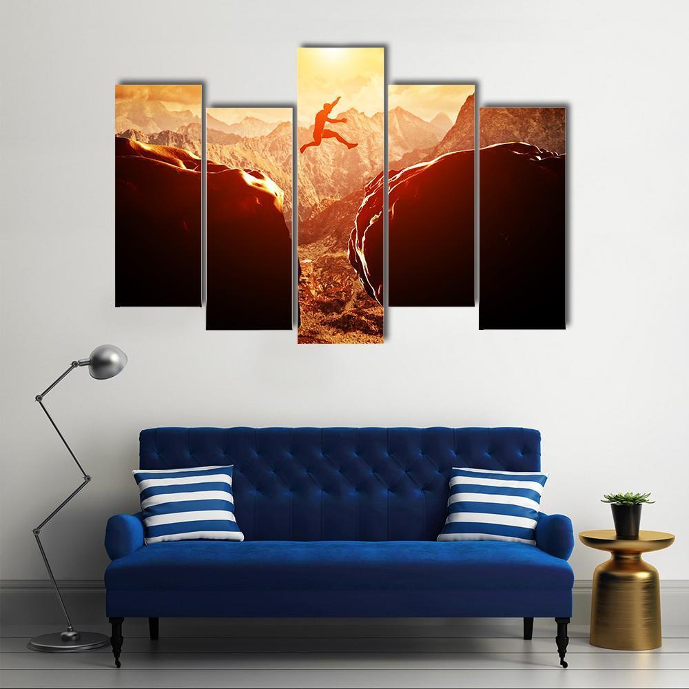 Man Jumping Through Rocks Canvas Wall Art-5 Pop-Gallery Wrap-47" x 32"-Tiaracle
