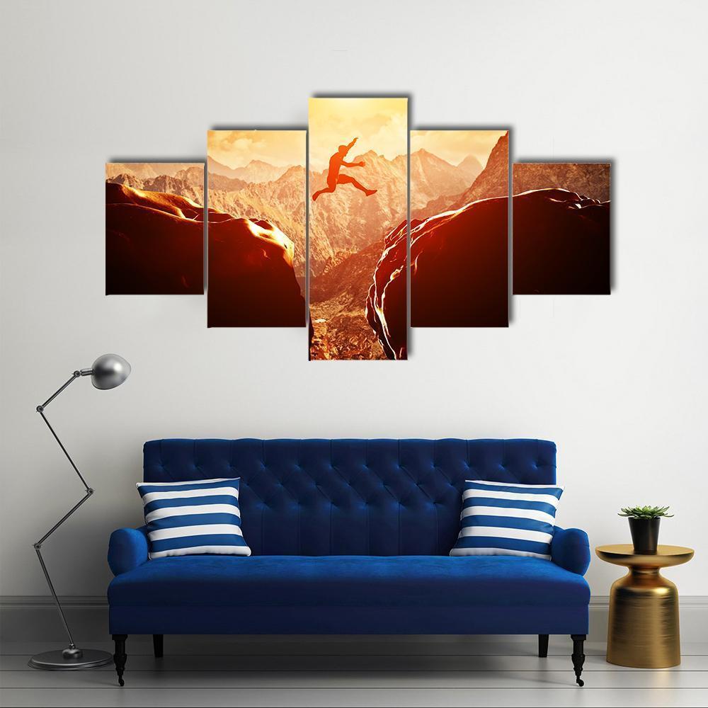 Man Jumping Through Rocks Canvas Wall Art-5 Star-Gallery Wrap-62" x 32"-Tiaracle