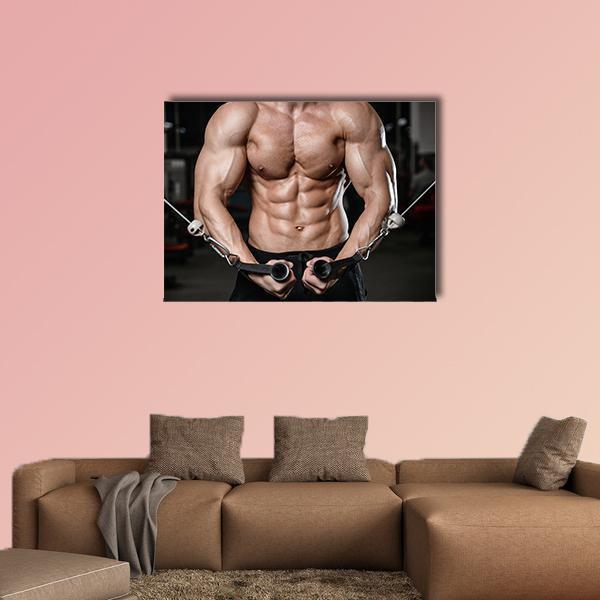Man Training in Gym Canvas Wall Art in black and beige, single panel hung on a wall
