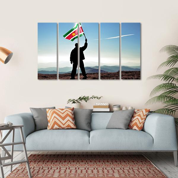 Man With Waving Suriname Flag Canvas Wall Art-5 Horizontal-Gallery Wrap-22" x 12"-Tiaracle