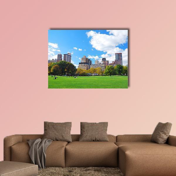 Central Park Manhattan Skyline Canvas Wall Art in white, green and blue, single panel hung on a wall