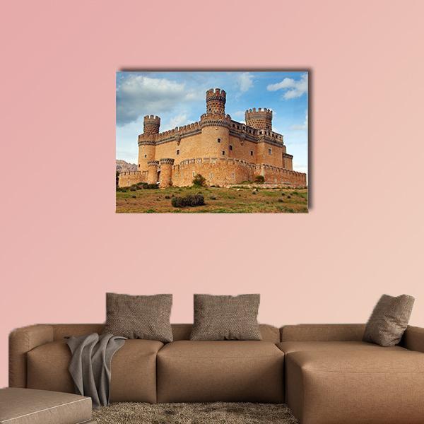 Castle of Mendoza Canvas Wall Art in beige, brown and blue, single panel hung on a wall