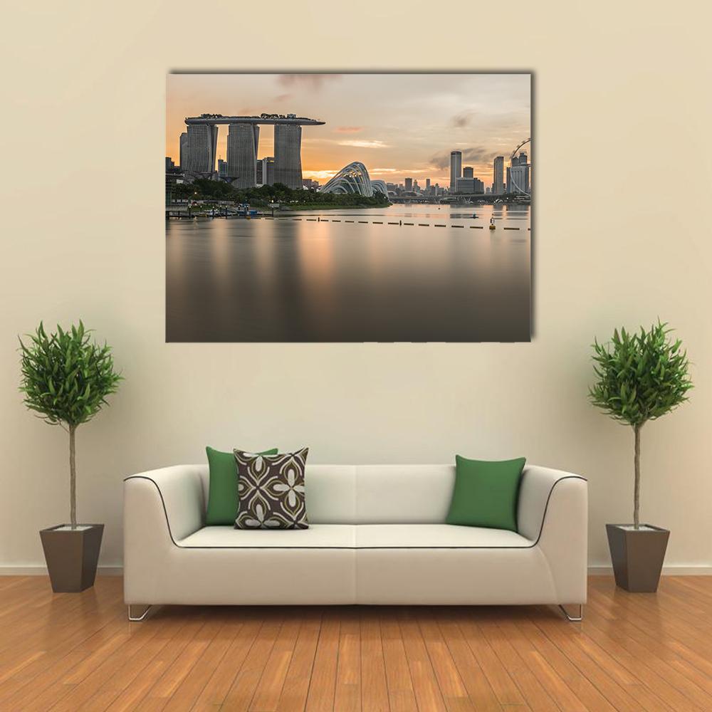 Marina Bay Sands with Singapore Flyer at Sunset Canvas Wall Art in gray, beige and orange, single panel hung on a wall