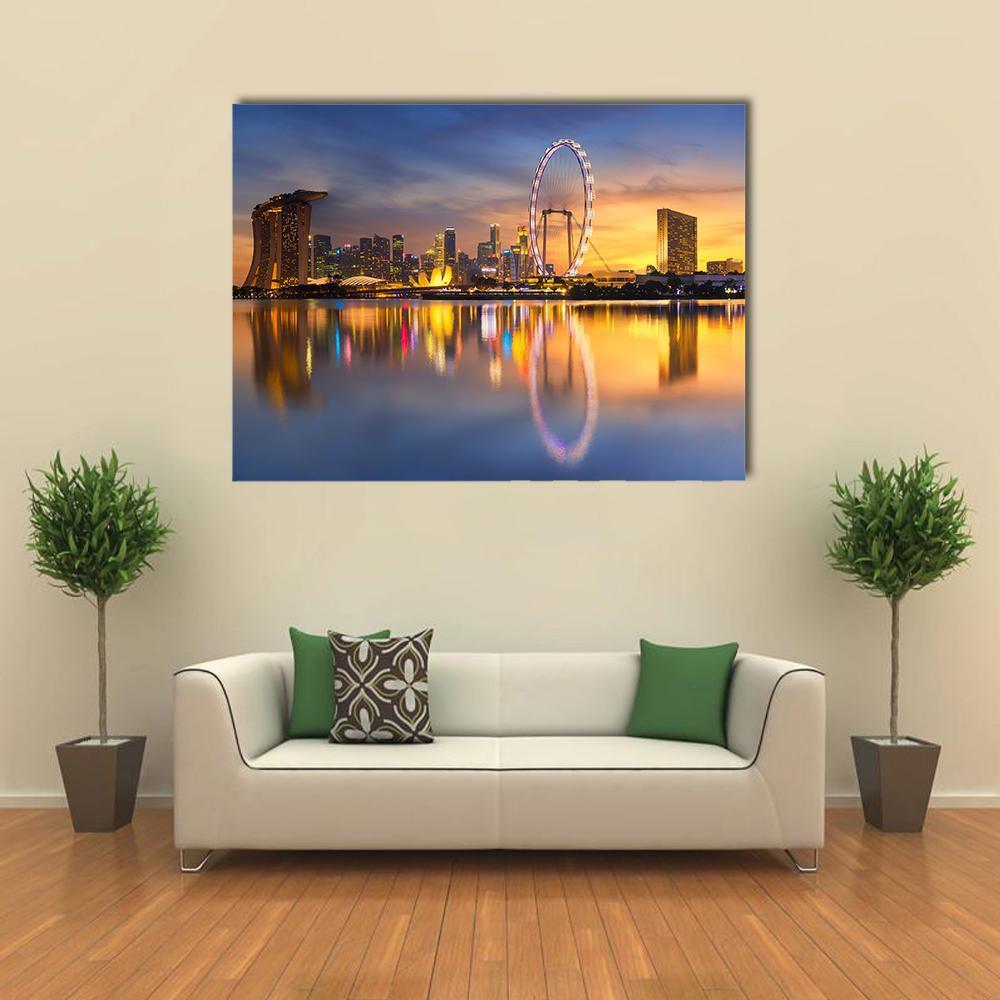 Marina Bay Skyline at Dusk Canvas Wall Art in orange, yellow and blue, single panel hung on a wall