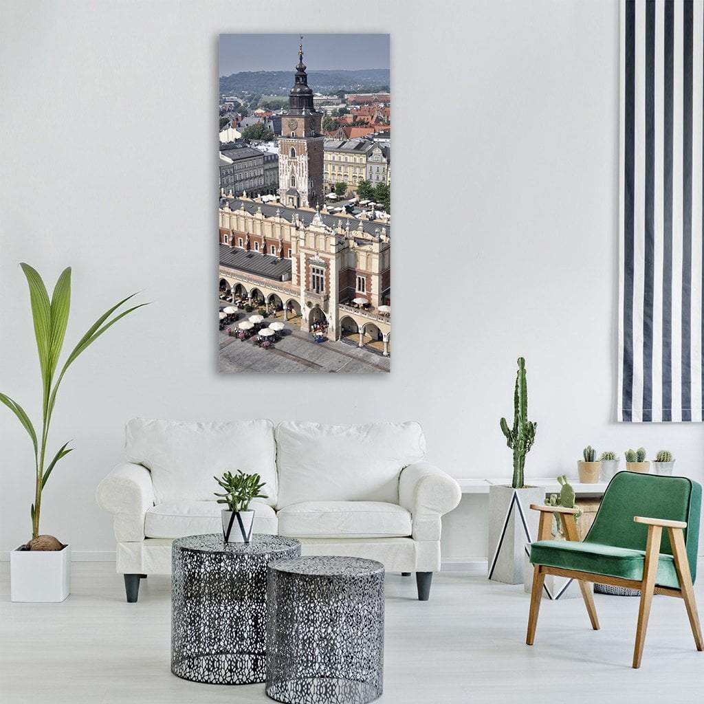 Kraków Cloth Hall and Town Hall Tower Vertical Canvas Wall Art in gray, beige and blue, single vertical panel hung on a wall