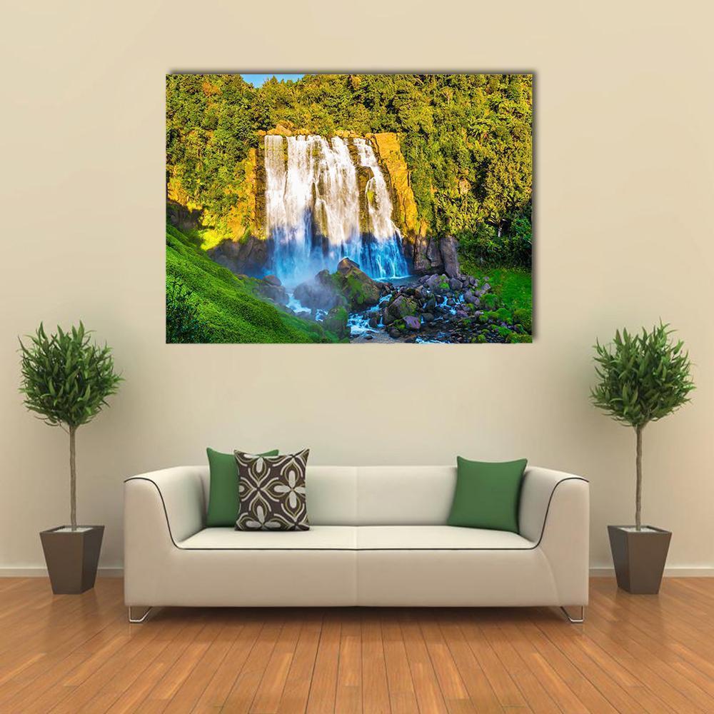 Marokopa Falls Waterfall Photography Canvas Wall Art in white, brown and green, single panel hung on a wall