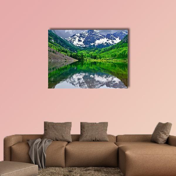 Maroon Bells Mountains with Lake Reflection Canvas Wall Art in gray, green and blue, single panel hung on a wall