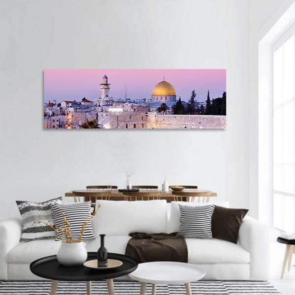 Al Aqsa and Old City at Dusk Panoramic Canvas Wall Art in gold, purple and pink, hung on a wall