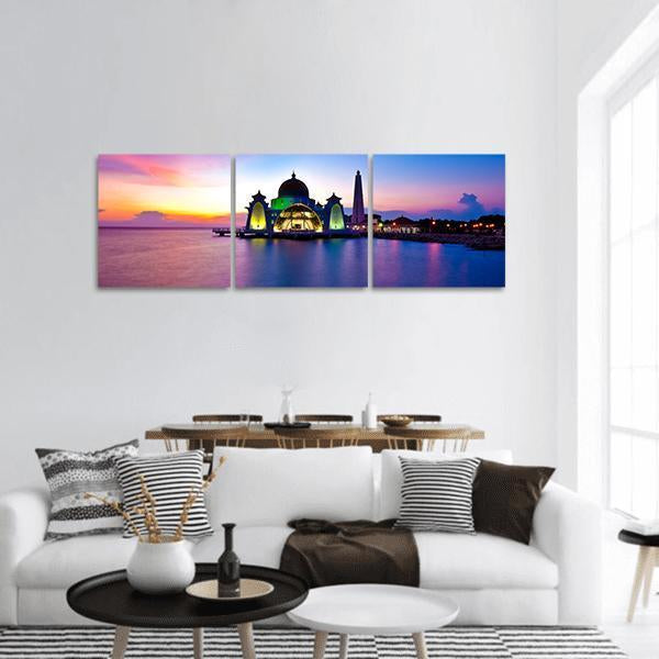 Masjid Selat Melaka Sunset Reflection Panoramic Canvas Wall Art in orange, blue and purple, hung on a wall