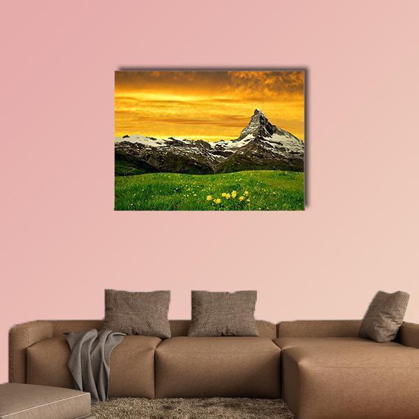Matterhorn and Wildflower Meadow at Sunset Canvas Wall Art in orange, yellow and green, single panel hung on a wall