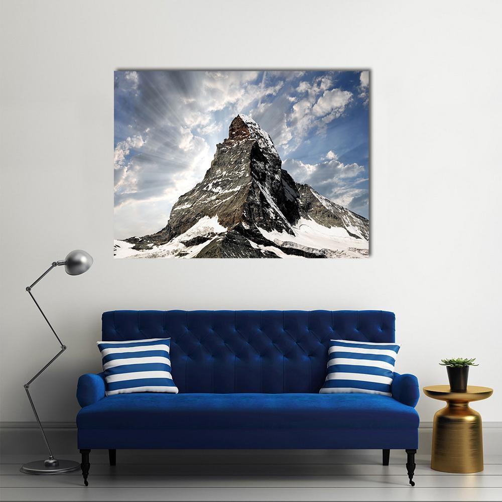 Matterhorn Peak with Sunbeams Canvas Wall Art in white, gray and blue, single panel hung on a wall