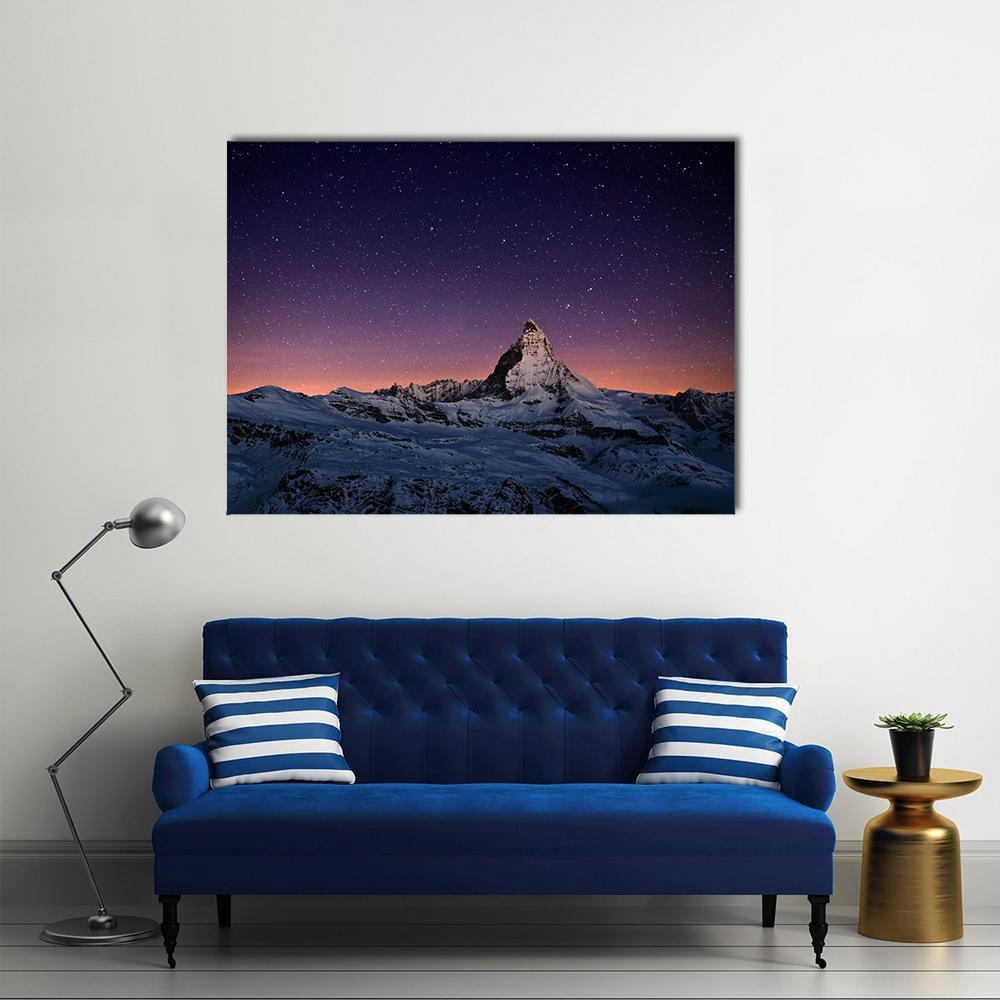 Matterhorn Peak Under Starry Sky Canvas Wall Art in black, blue and purple, single panel hung on a wall