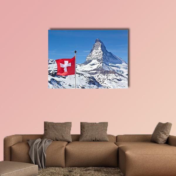 Matterhorn with Swiss Flag Canvas Wall Art in white, red and blue, single panel hung on a wall