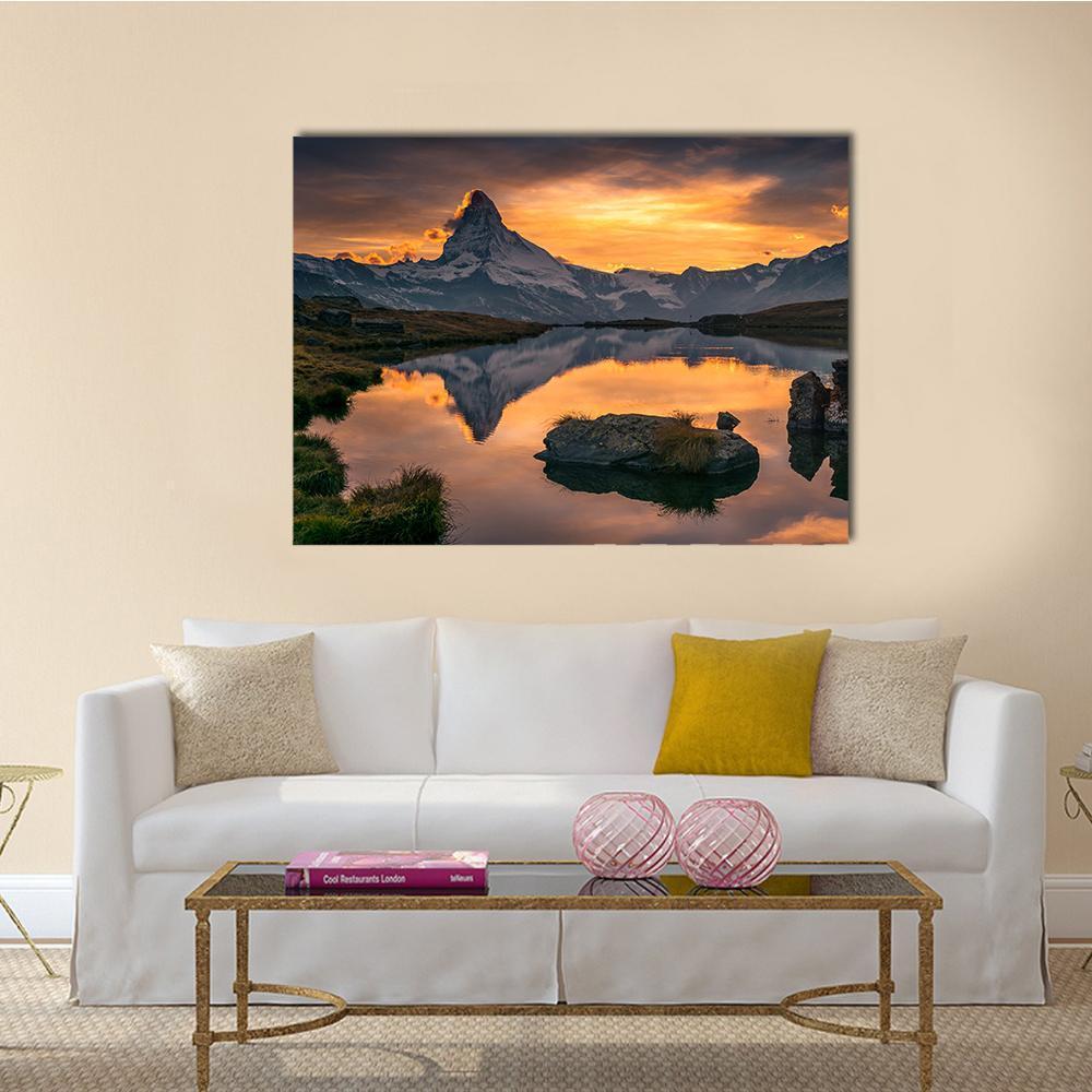 Matterhorn at Sunset Canvas Wall Art in brown, orange and blue, single panel hung on a wall