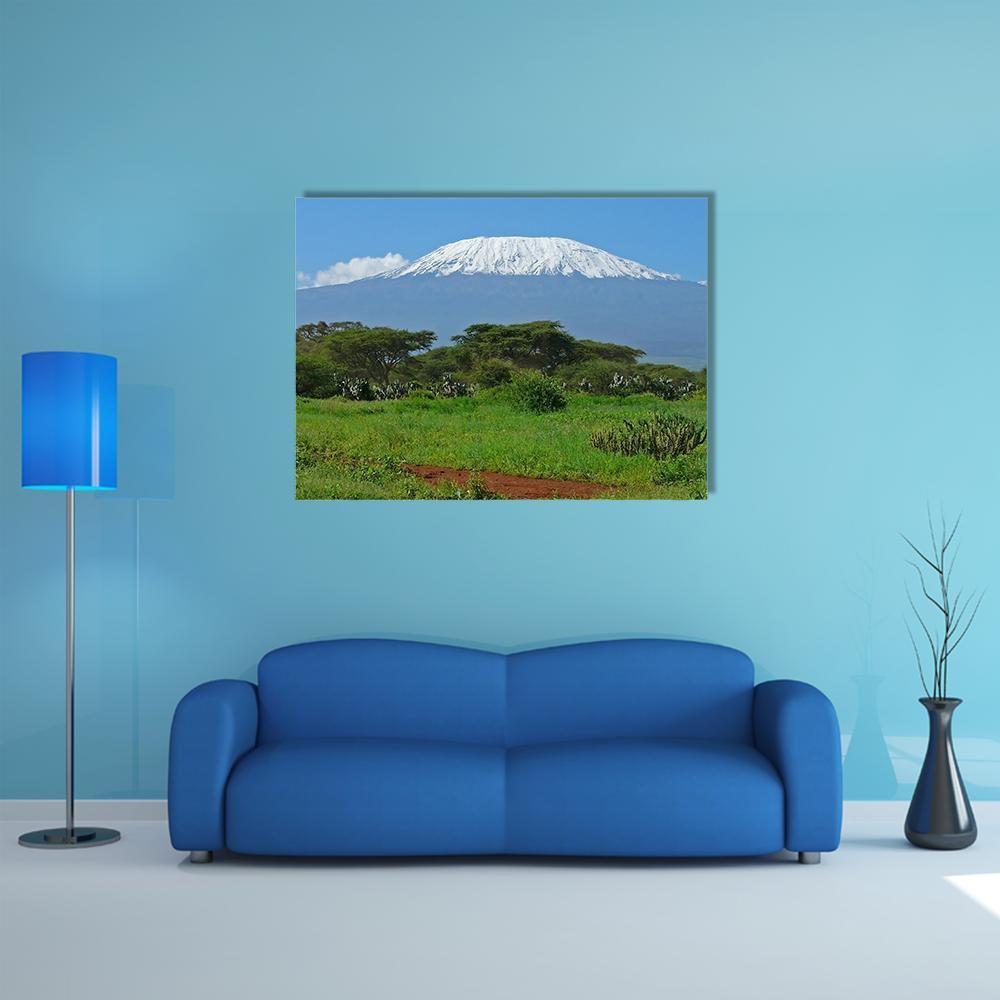 Mount Kilimanjaro Over Savanna Canvas Wall Art in white, green and blue, single panel hung on a wall
