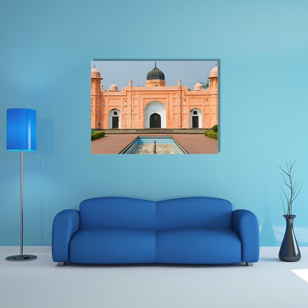 Tomb of Pari Bibi Canvas Wall Art in orange, blue and pink, single panel hung on a wall