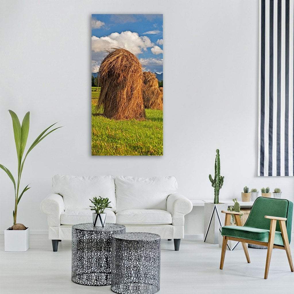 Meadow Field in Poland Vertical Canvas Wall Art in brown, green and blue, single vertical panel hung on a wall