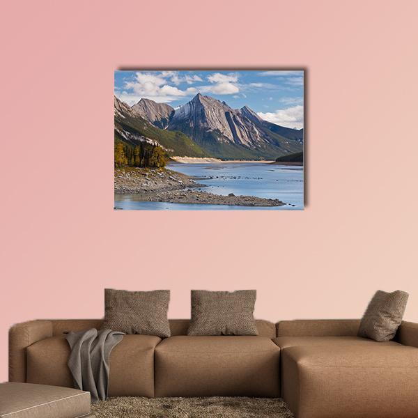 Medicine Lake Canada Reflections Canvas Wall Art in gray, brown and blue, single panel hung on a wall