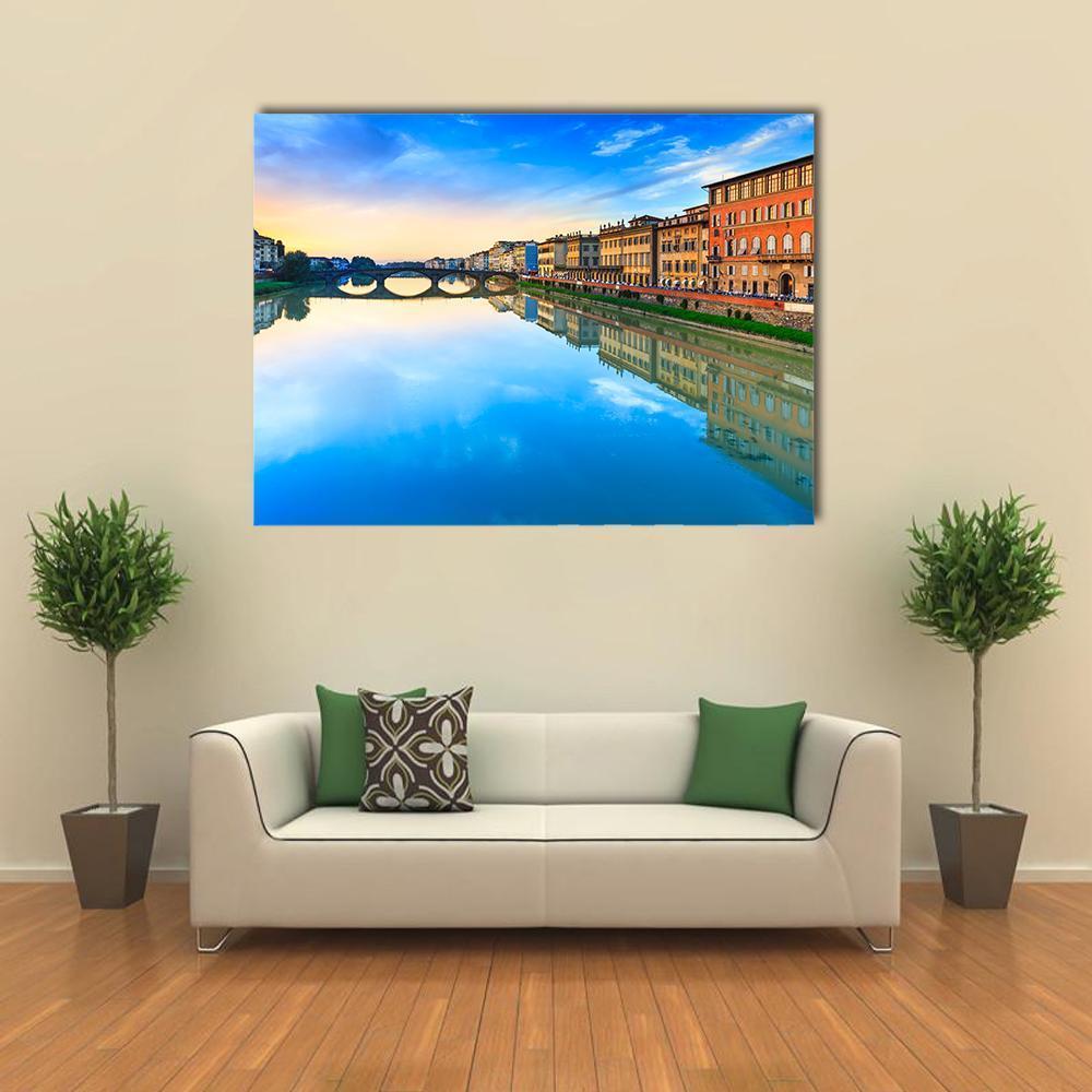 Carraia Medieval Bridge Canvas Wall Art in orange, yellow and blue, single panel hung on a wall