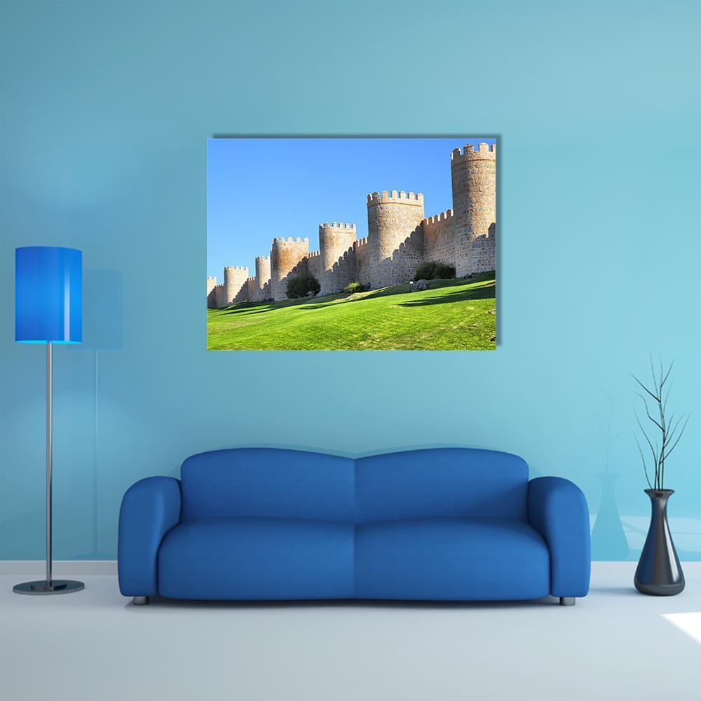 Castle with Stone Towers Canvas Wall Art in brown, green and blue, single panel hung on a wall