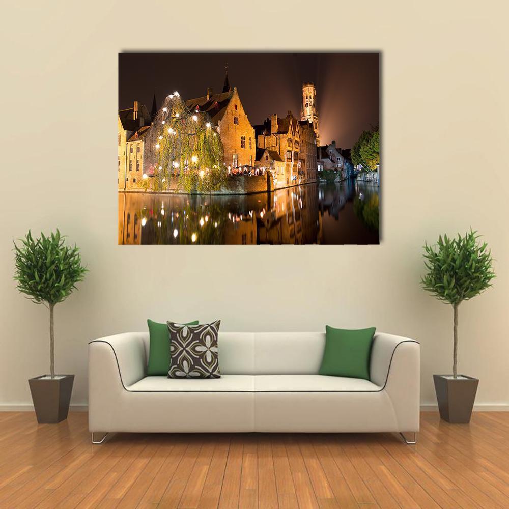 Canal with Christmas Lights at Night Canvas Wall Art in black, brown and yellow, single panel hung on a wall