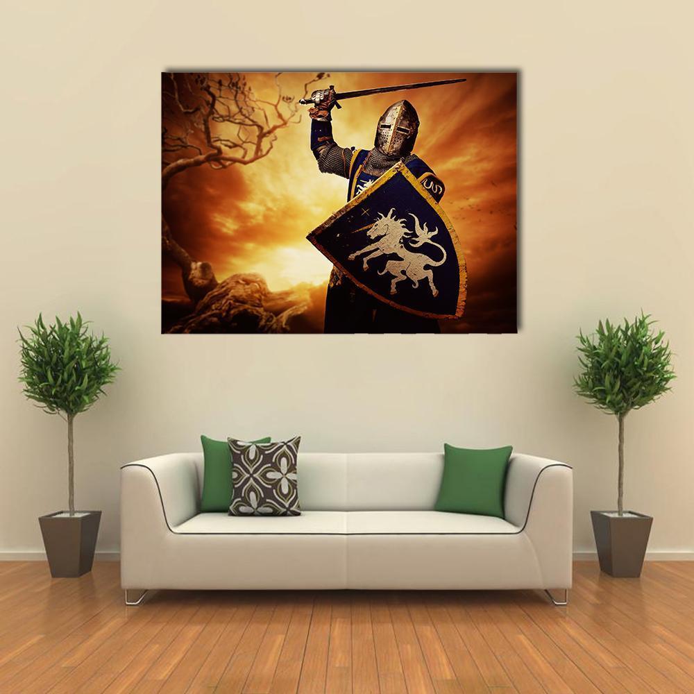 Medieval Knight at Dusk with Unicorn Shield Canvas Wall Art in black, orange and yellow, single panel hung on a wall